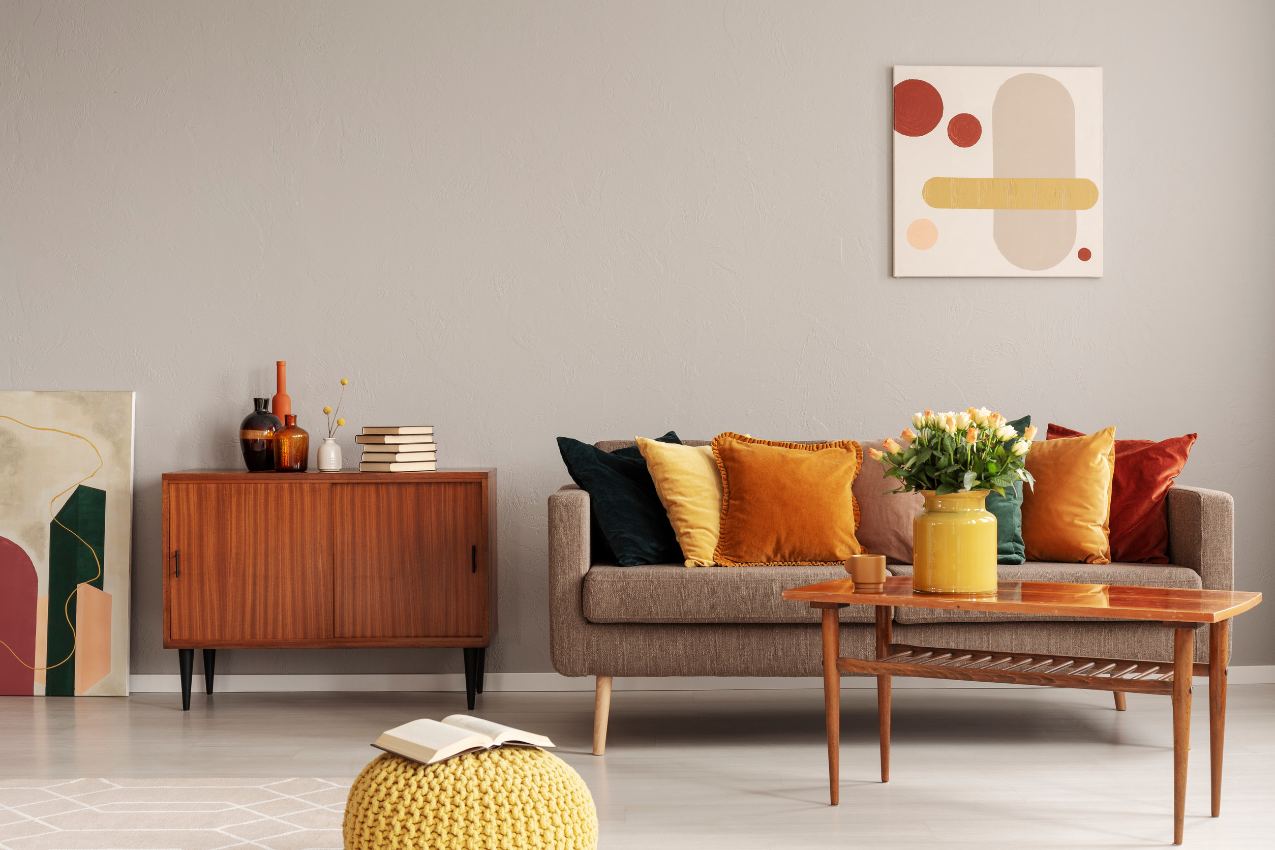 Retro design in trendy living room interior wooden furniture and comfortable couch
