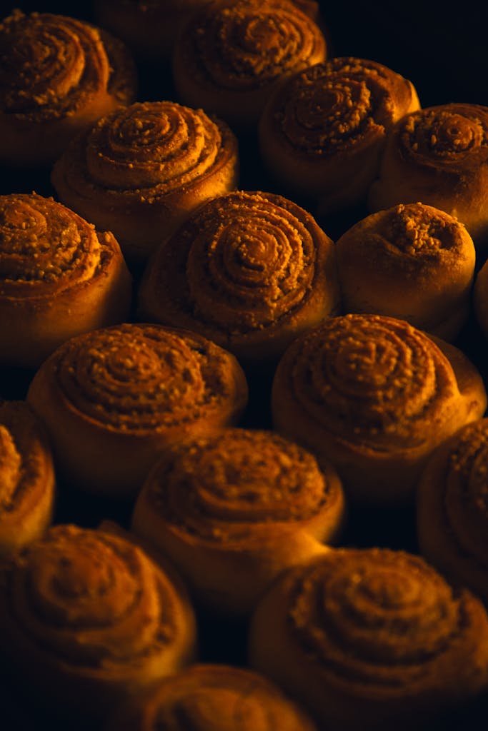 Warm cinnamon rolls fresh from the oven, a perfect baked treat for any occasion.