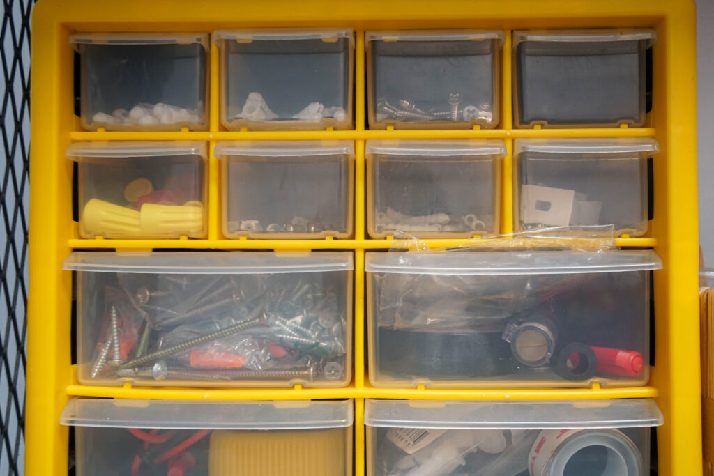 yellow storage box to keep screw and nut for house renovation