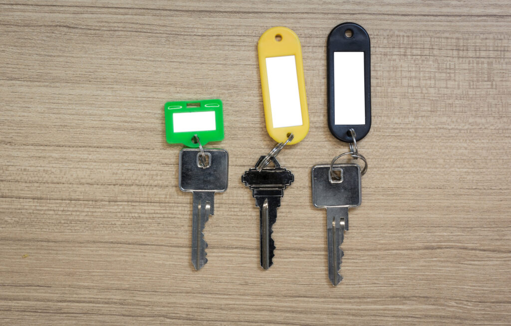 Key on wooden table with copy space.