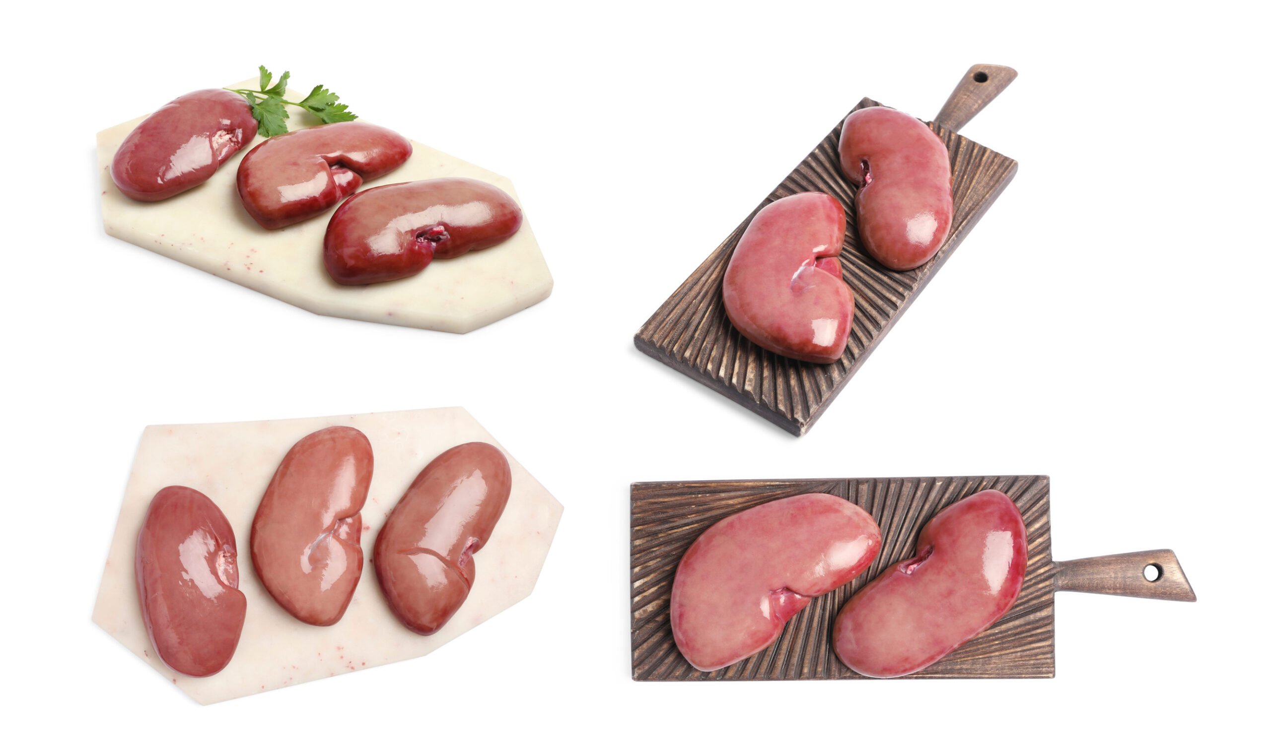 Set with fresh raw kidneys on white background