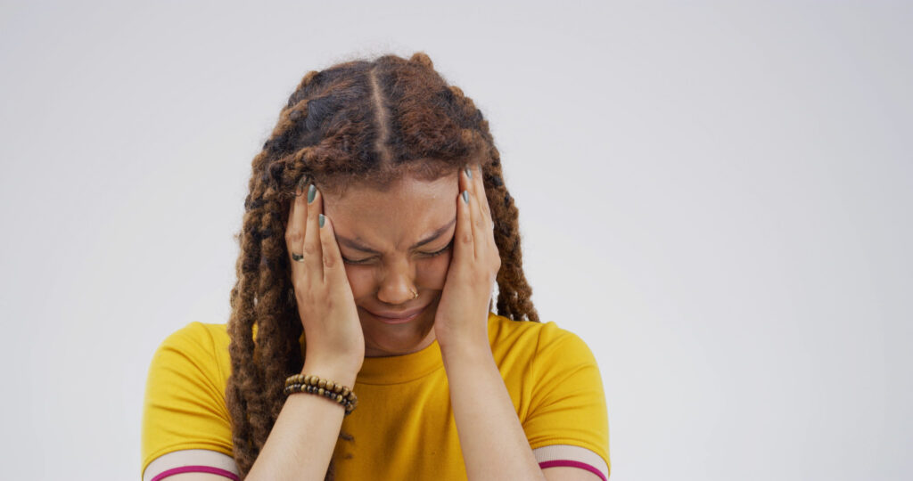 11 Signs You Shouldn’t Ignore, Unless You’re Ready for Things to Get Worse 3 Sad, woman and crying with grief in studio for bad news, mourning loss and emotional breakdown. Female person, sorrow and reaction for trauma memory, heart broken and panic attack on white background