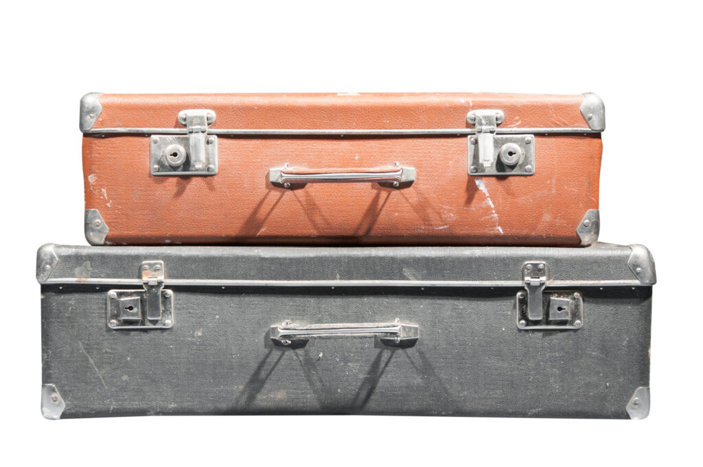 Old suitcase on a white background