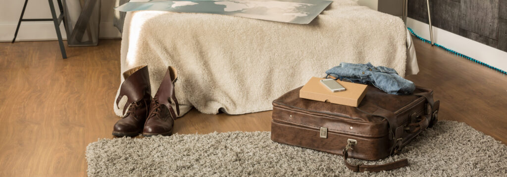 Luggage and comfortable shoes in the bedroom