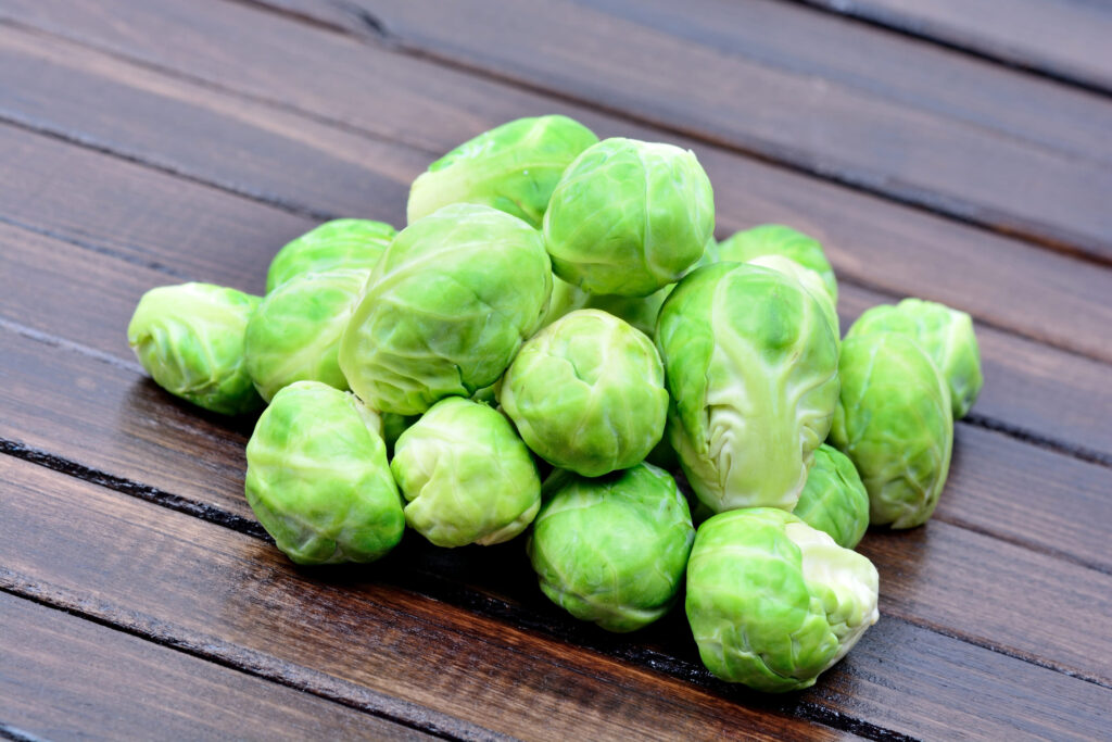 Group of brussels sprouts on wooden table