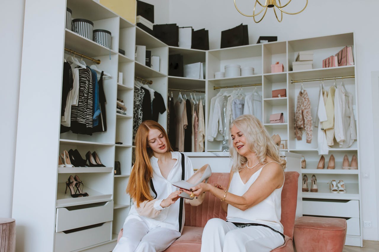 grandmother-and-granddaughter-looking-the-shoes-