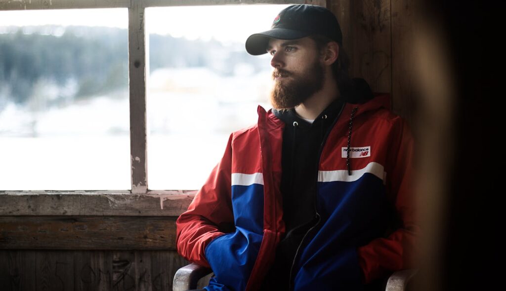 /man-wearing-blue-red-and-white-jacket-