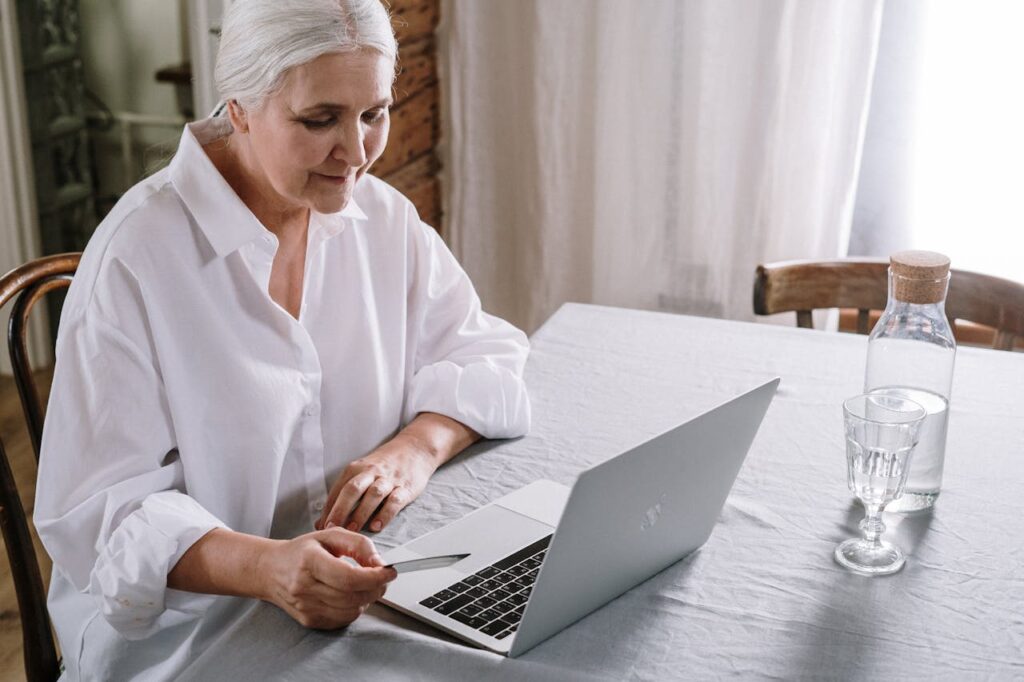/an-old-woman-using-a-laptop-