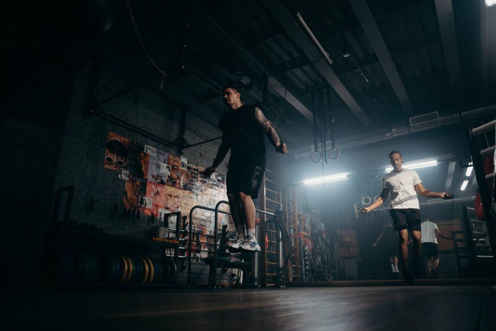 /man-in-black-t-shirt-and-black-pants-playing-skateboard