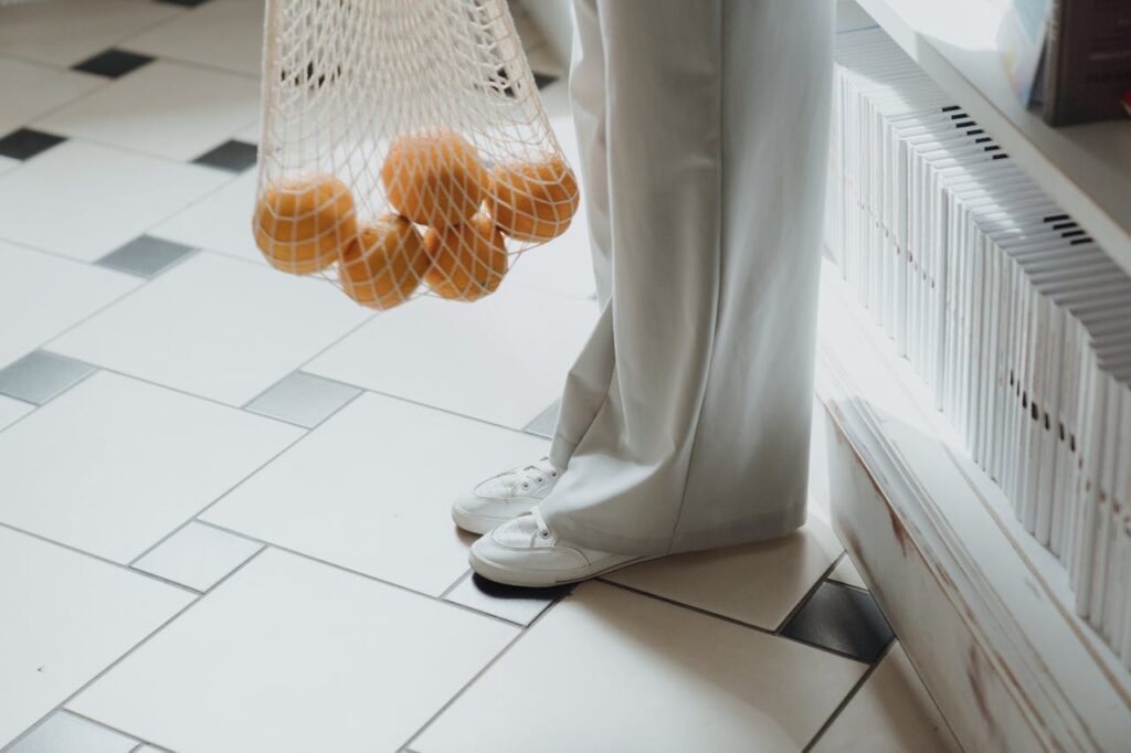 /person-in-white-pants-and-white-shoes