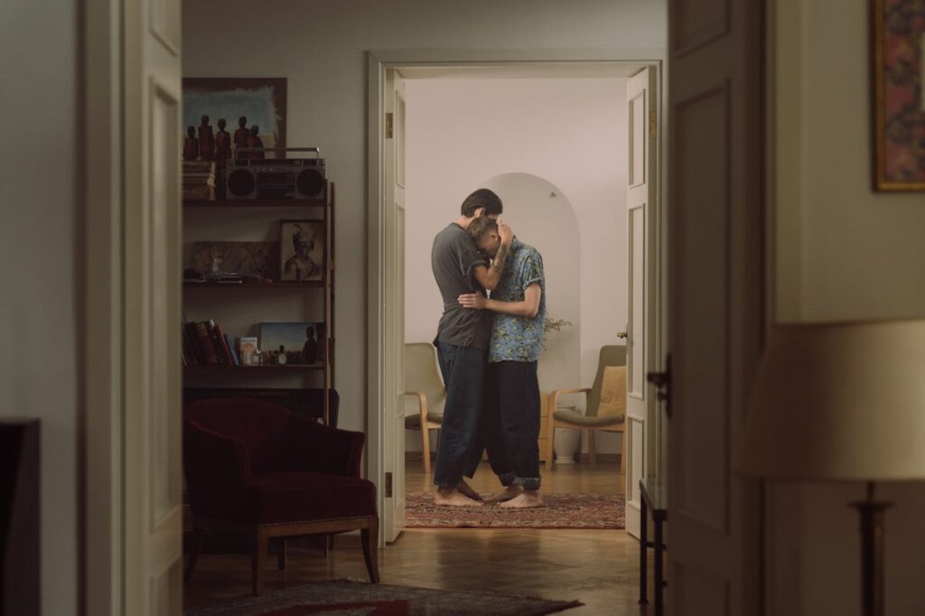 couple-cuddling-in-cozy-home