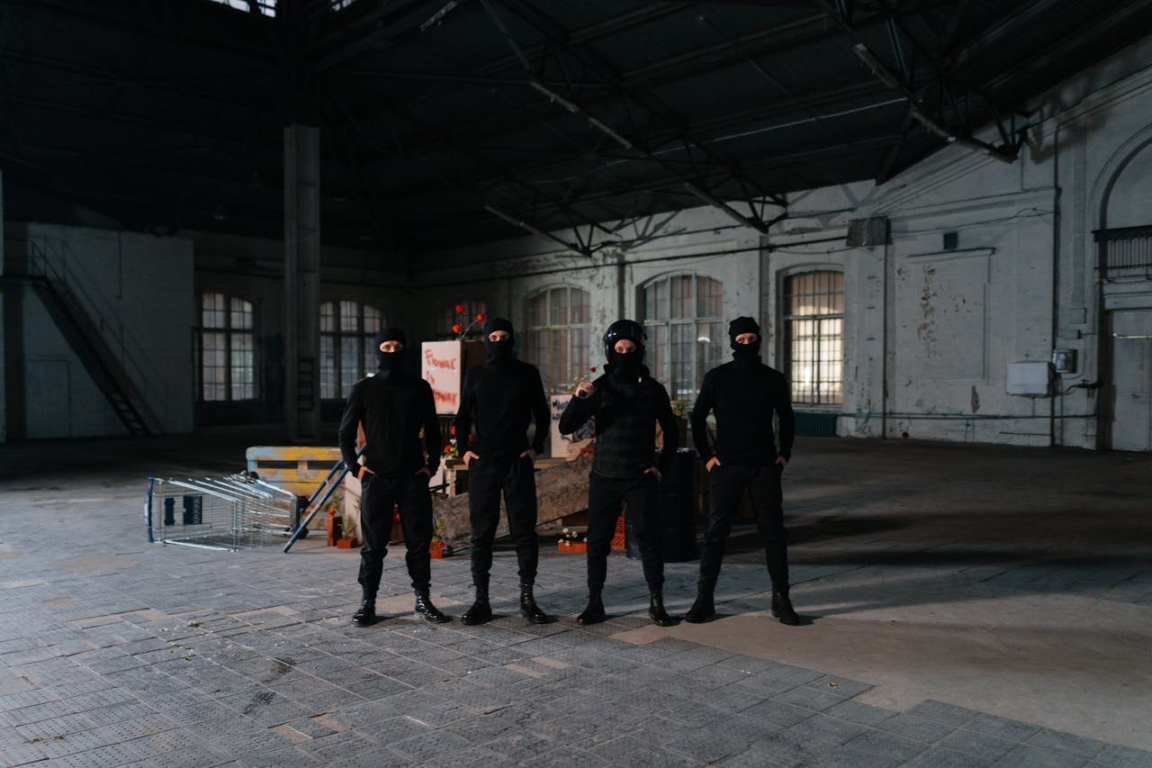 /portrait-of-four-security-guards-in-police-gear-
