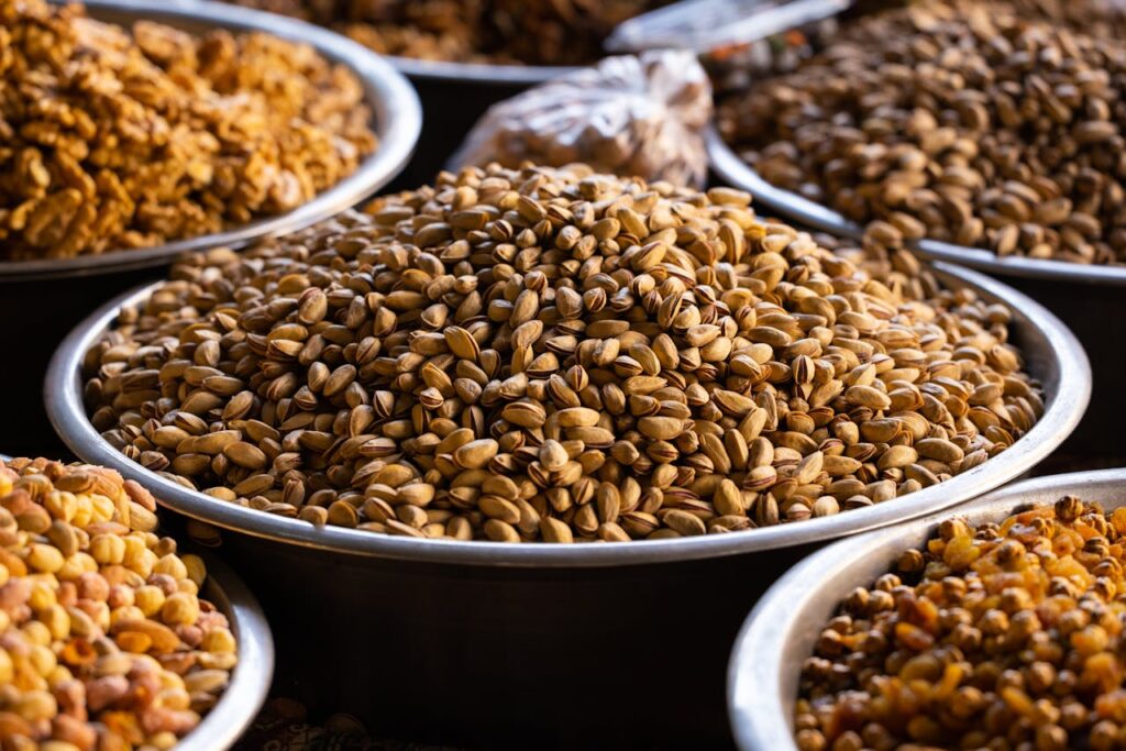 /assorted-nuts-on-stainless-containers-