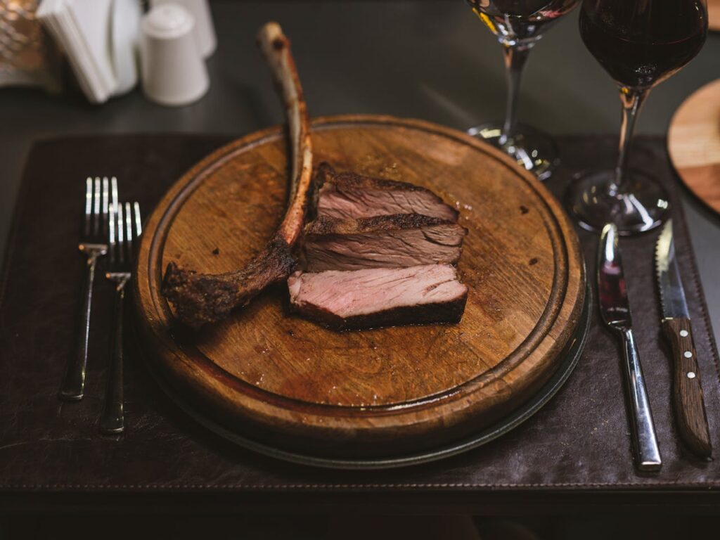 elicious-beef-steak-on-wooden-board-with-wine