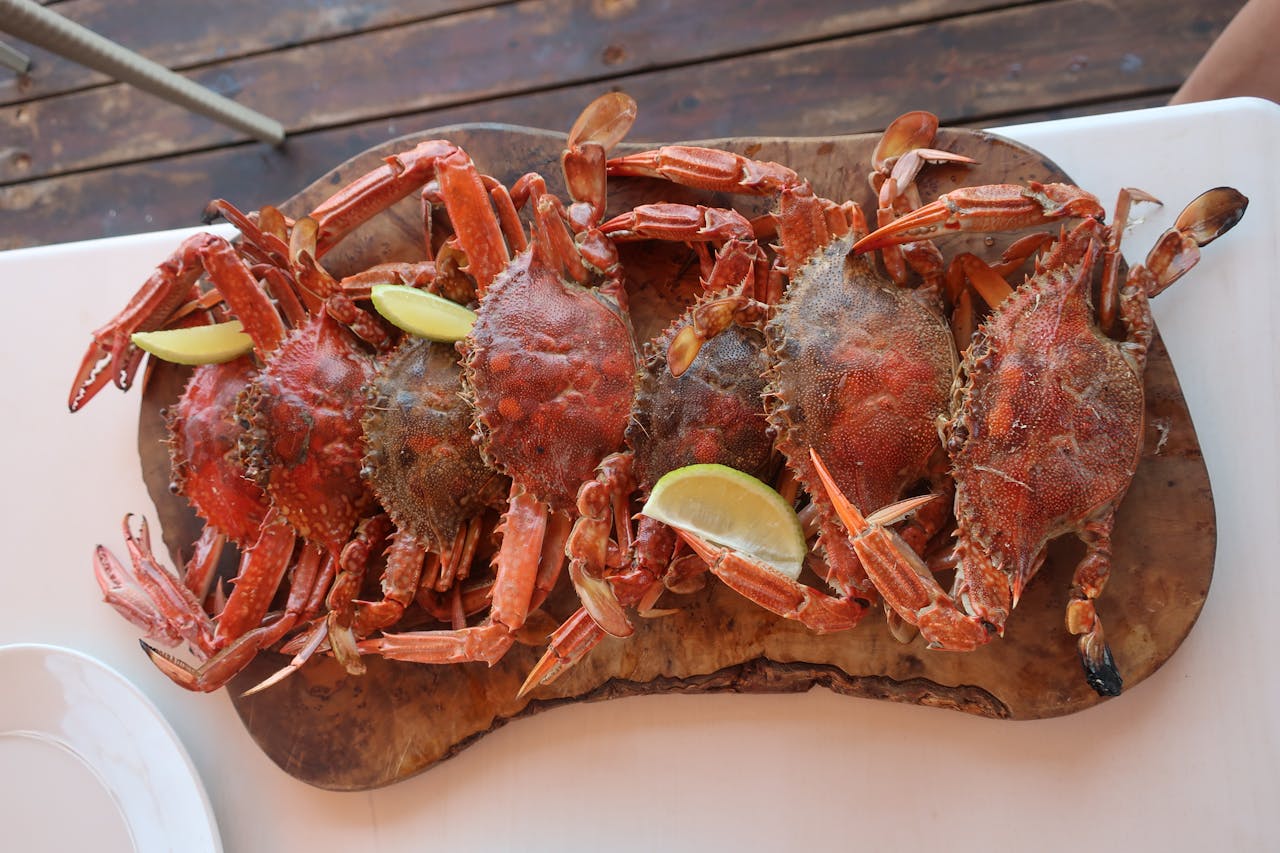 cooked-crabs-on-a-wooden-chopping-board-