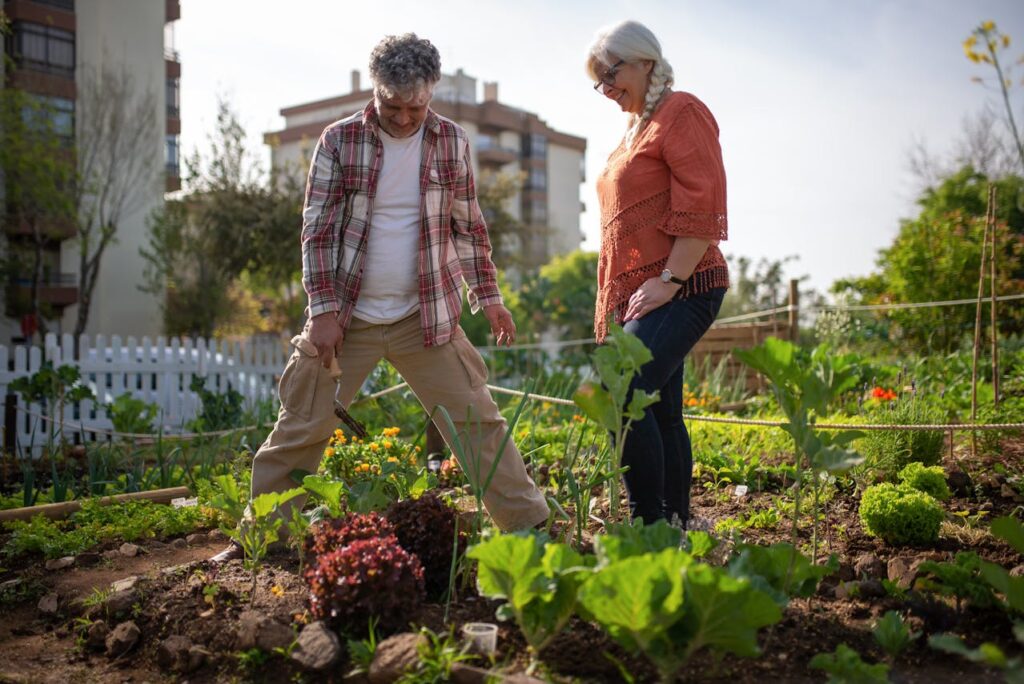 woman-standing-at-their-vegetable-garden