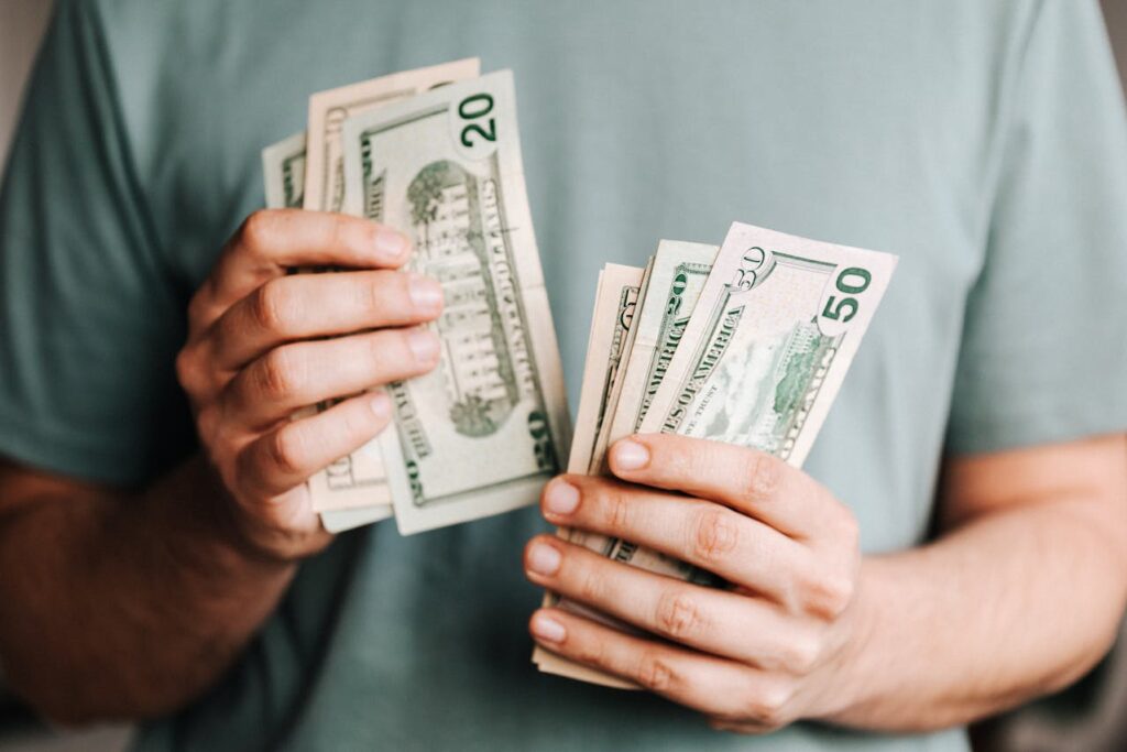 counting-dollar-banknotes-
