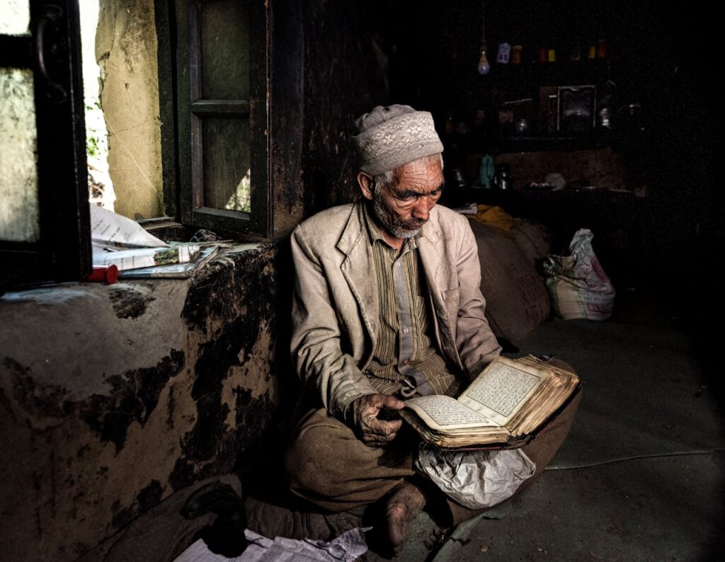 elderly-man-reading-book-