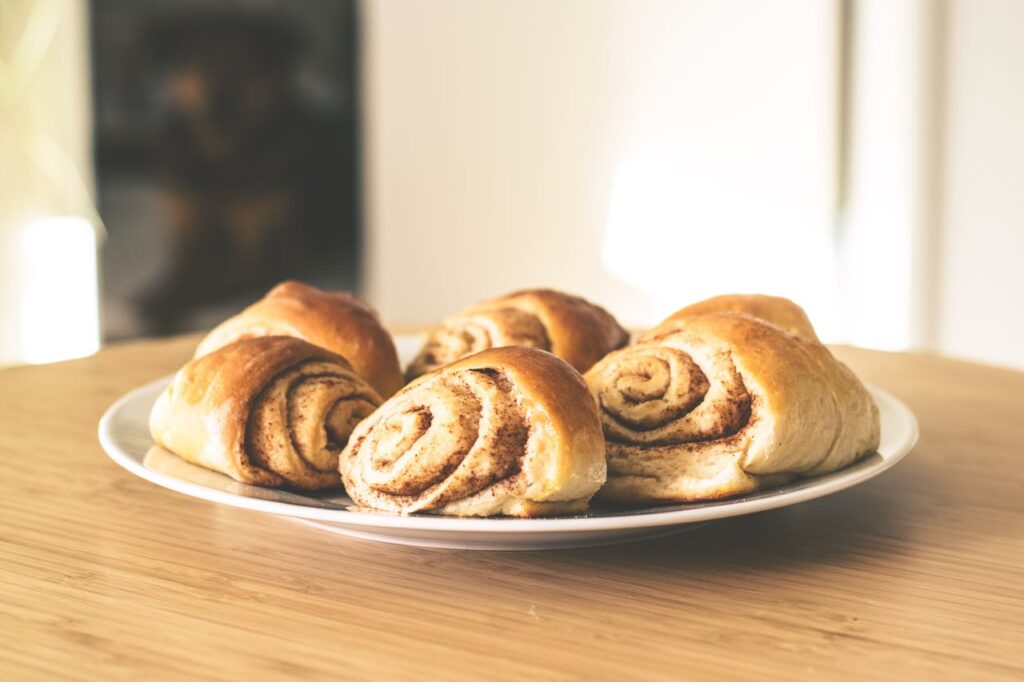 /bread-on-white-ceramic-plate-