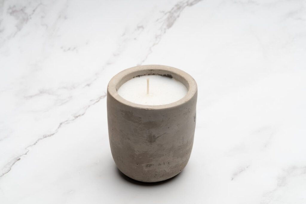 a-candle-on-ceramic-pot-