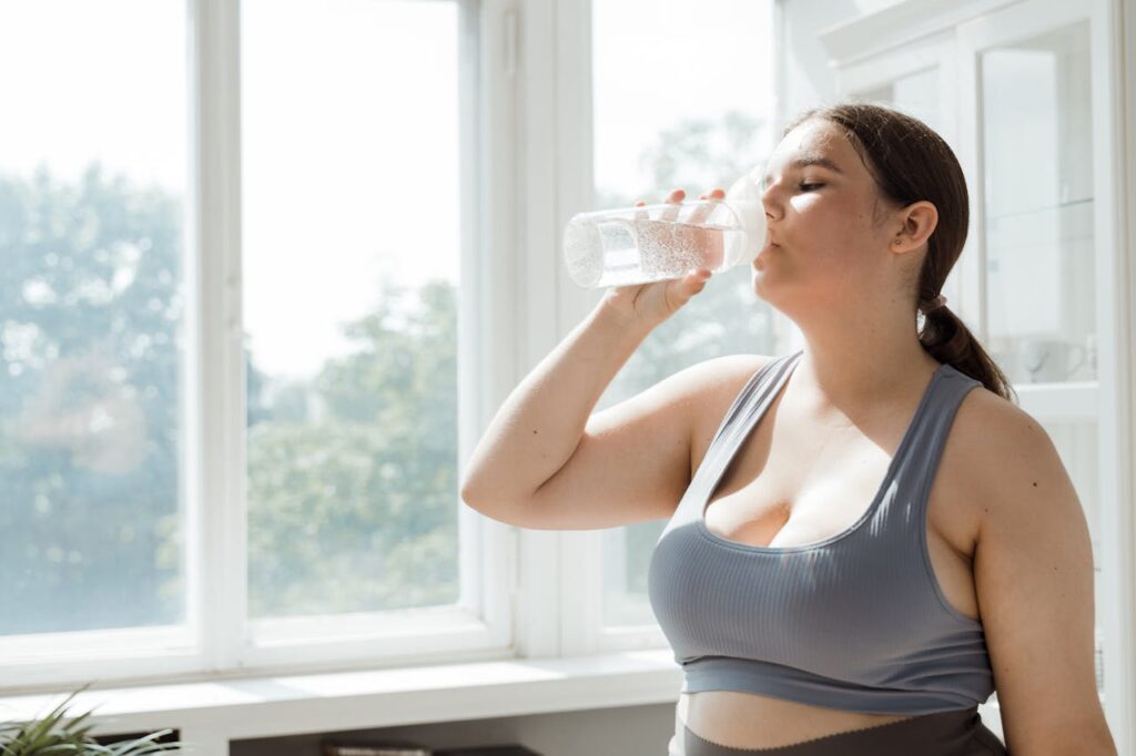 /a-woman-drinking-water-