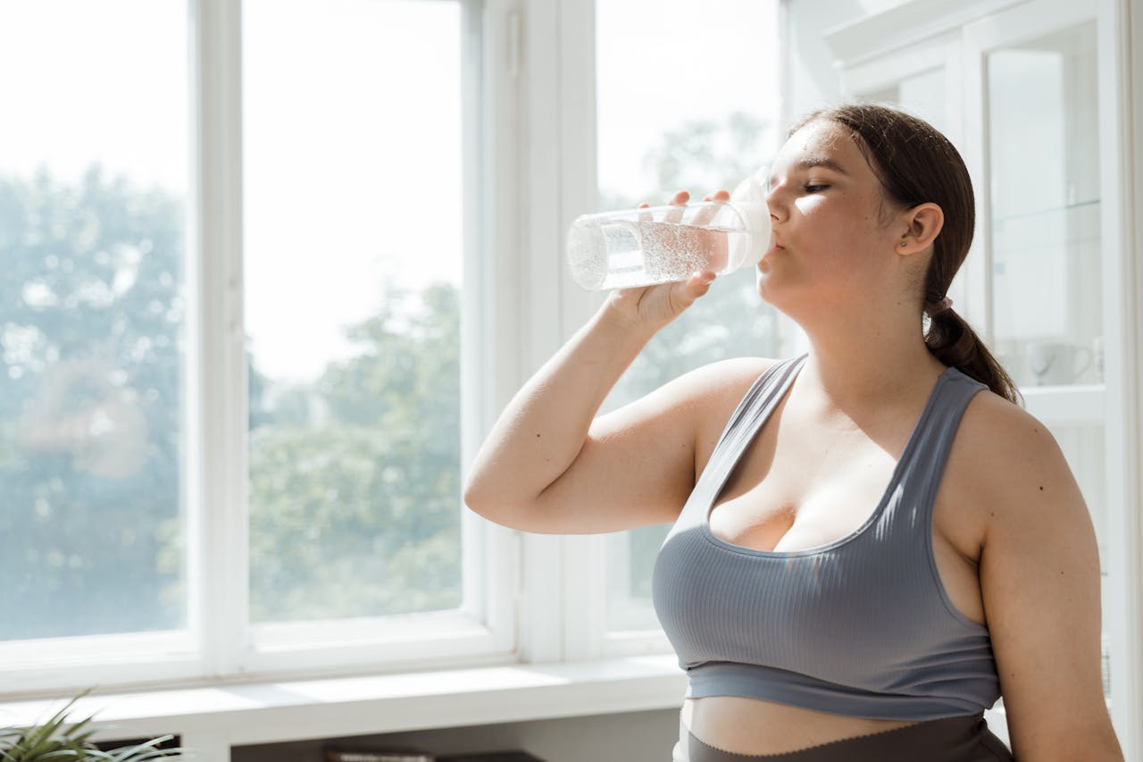 /a-woman-drinking-water-