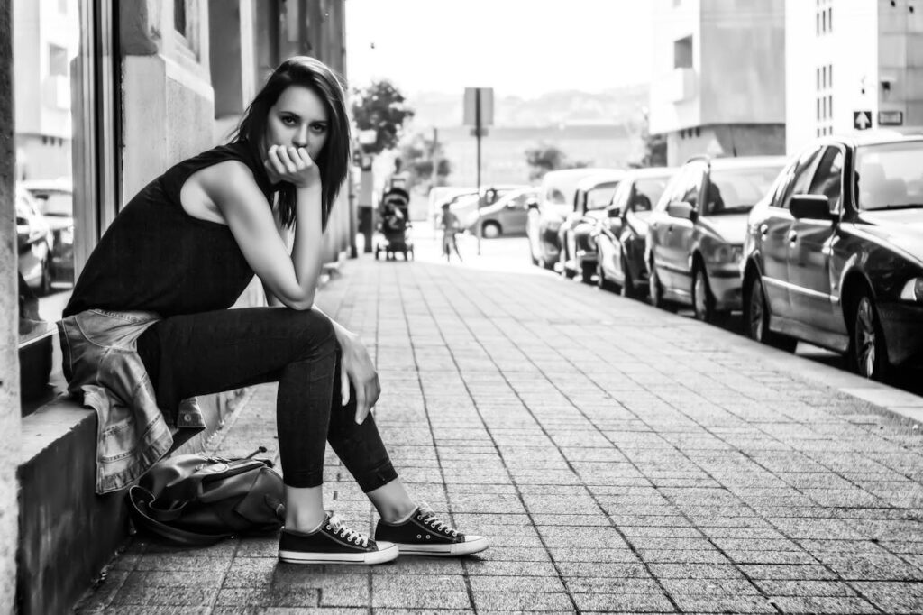 oman-sitting-on-the-stairs-while-taking-photo