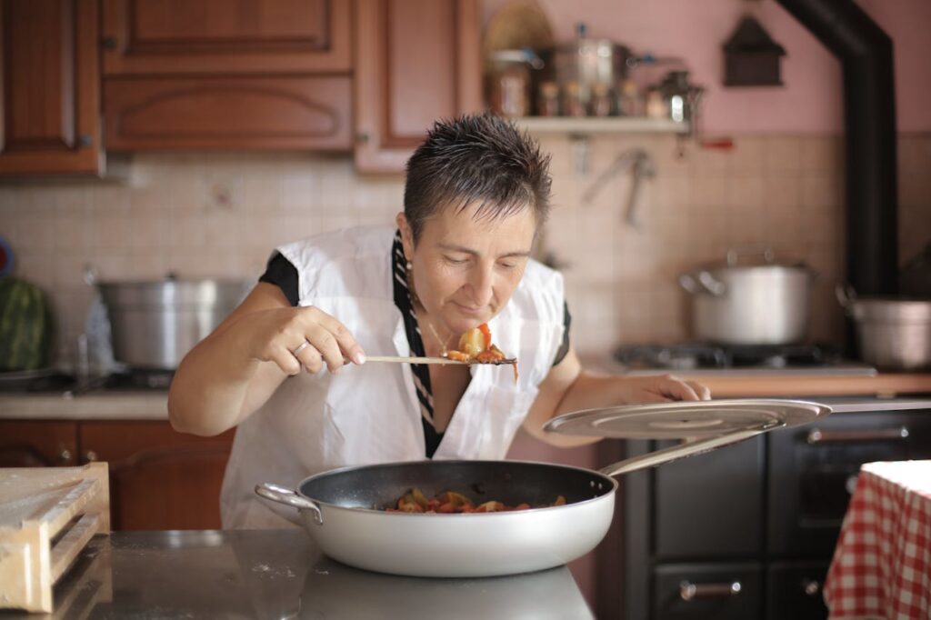 photo-of-woman-smelling-the-food-
