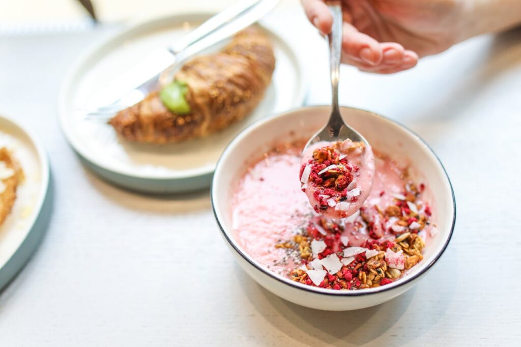 photo-of-person-holding-spoon-