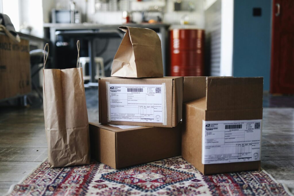 boxes-and-paper-bags-on-a-rug-