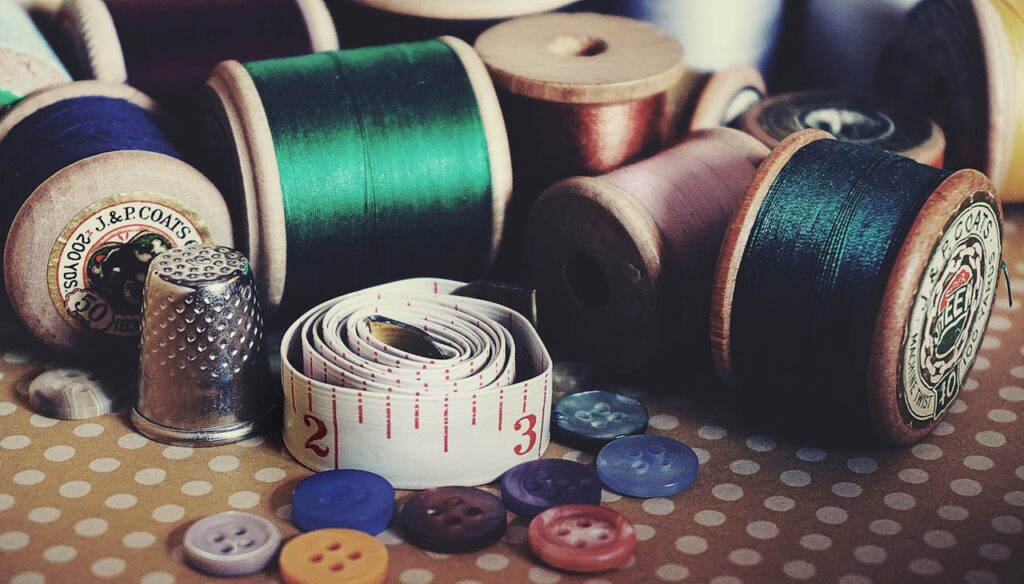 assorted-color-button-pin-on-brown-surface
