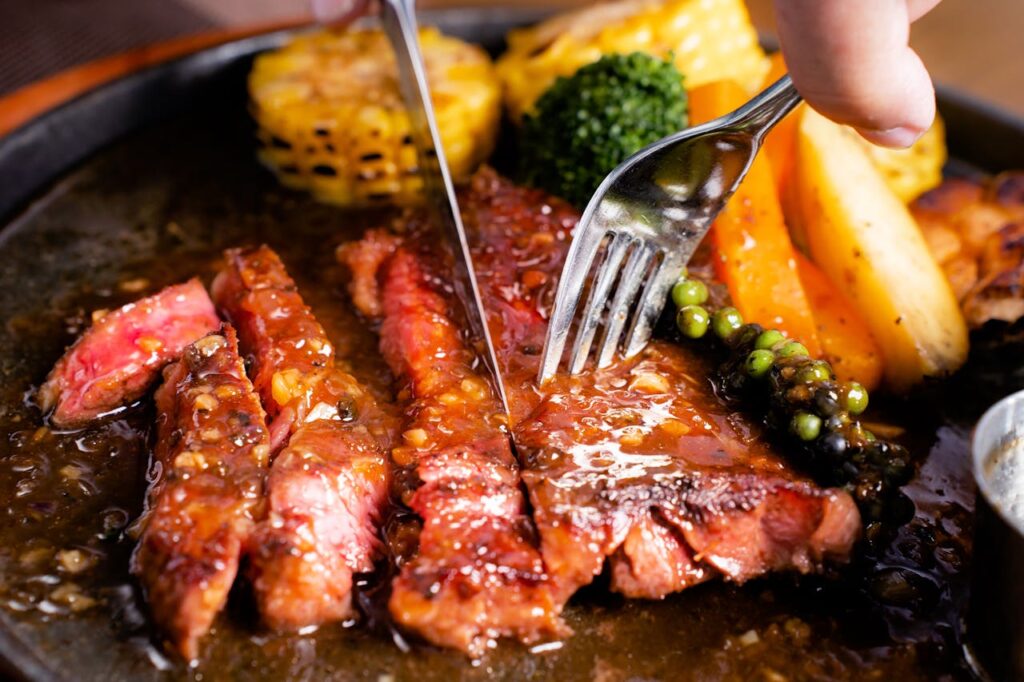 fried-meat-with-potatoes-and-corn-