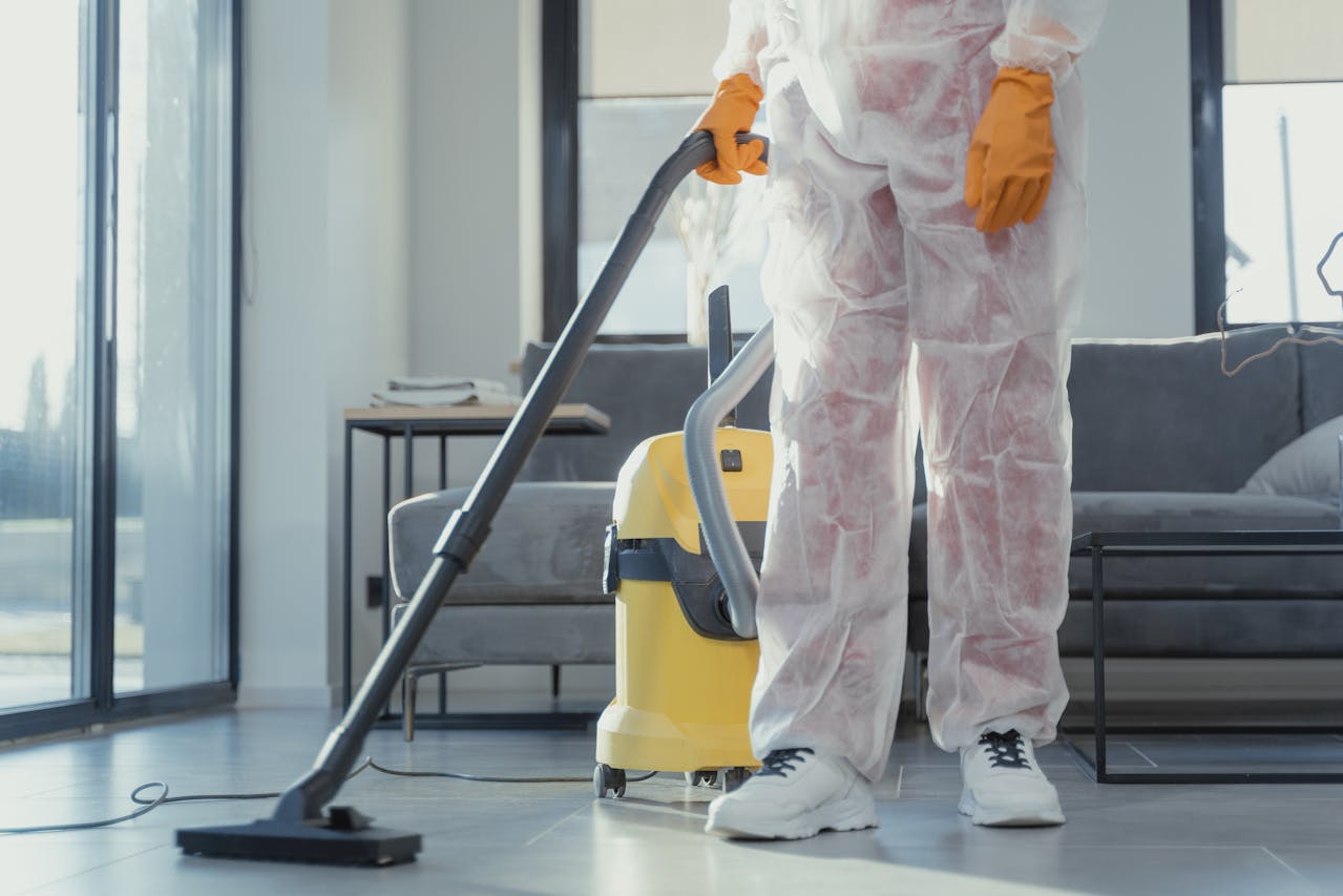 a-close-up-shot-of-a-person-using-a-vacuum-