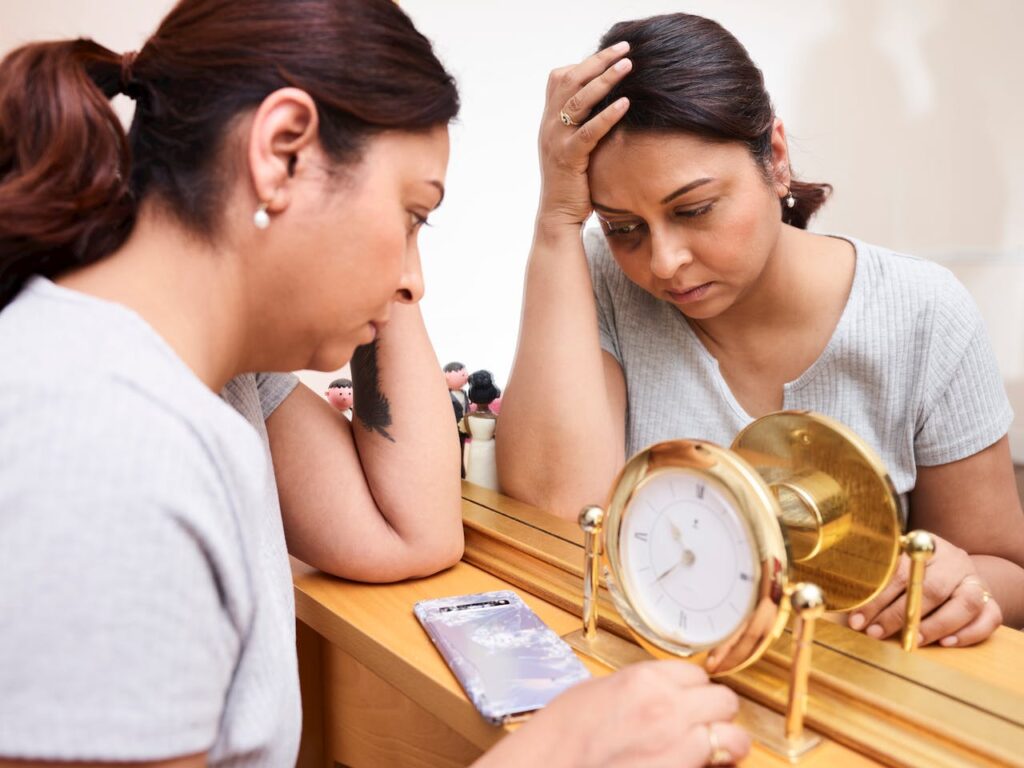 tired-woman-sitting-by-mirror-