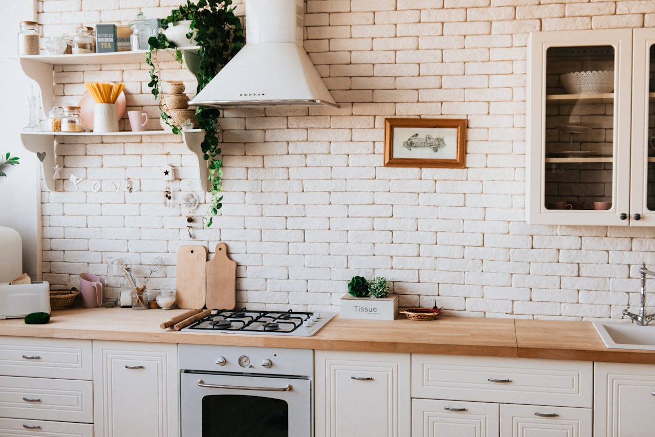 /chopping-boards-near-oven-under-hood-