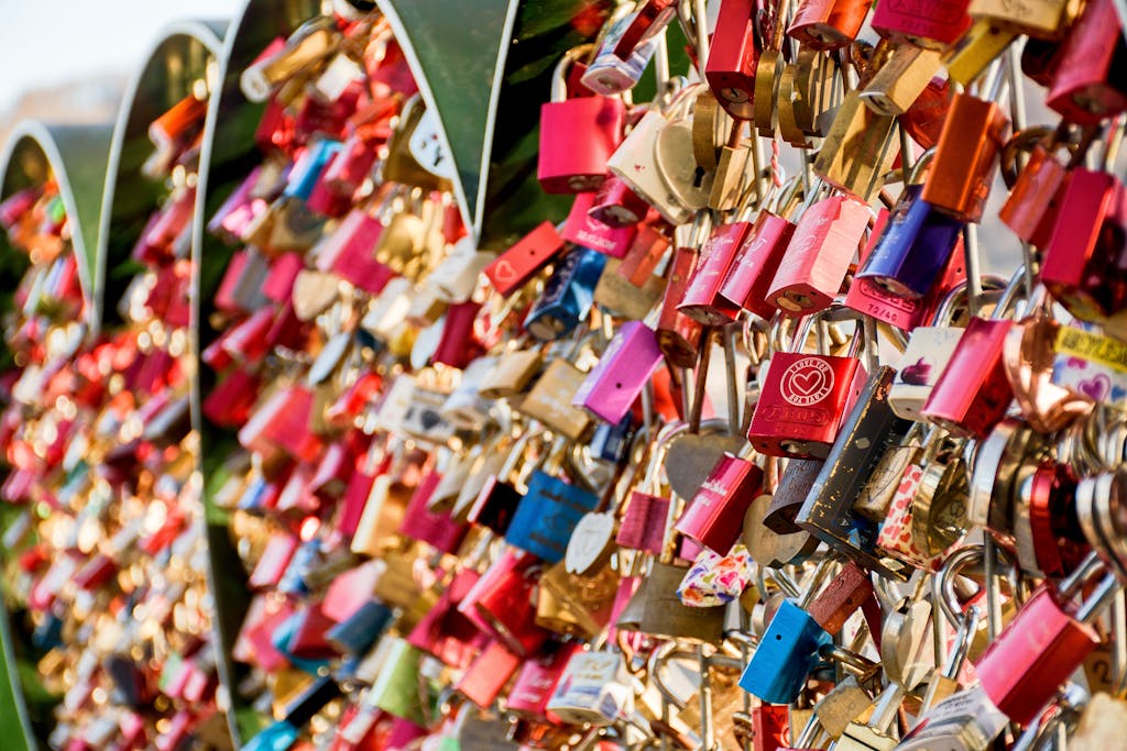 Vibrant love padlocks adorn a popular bridge in Gmunden, Austria, symbolizing eternal love.