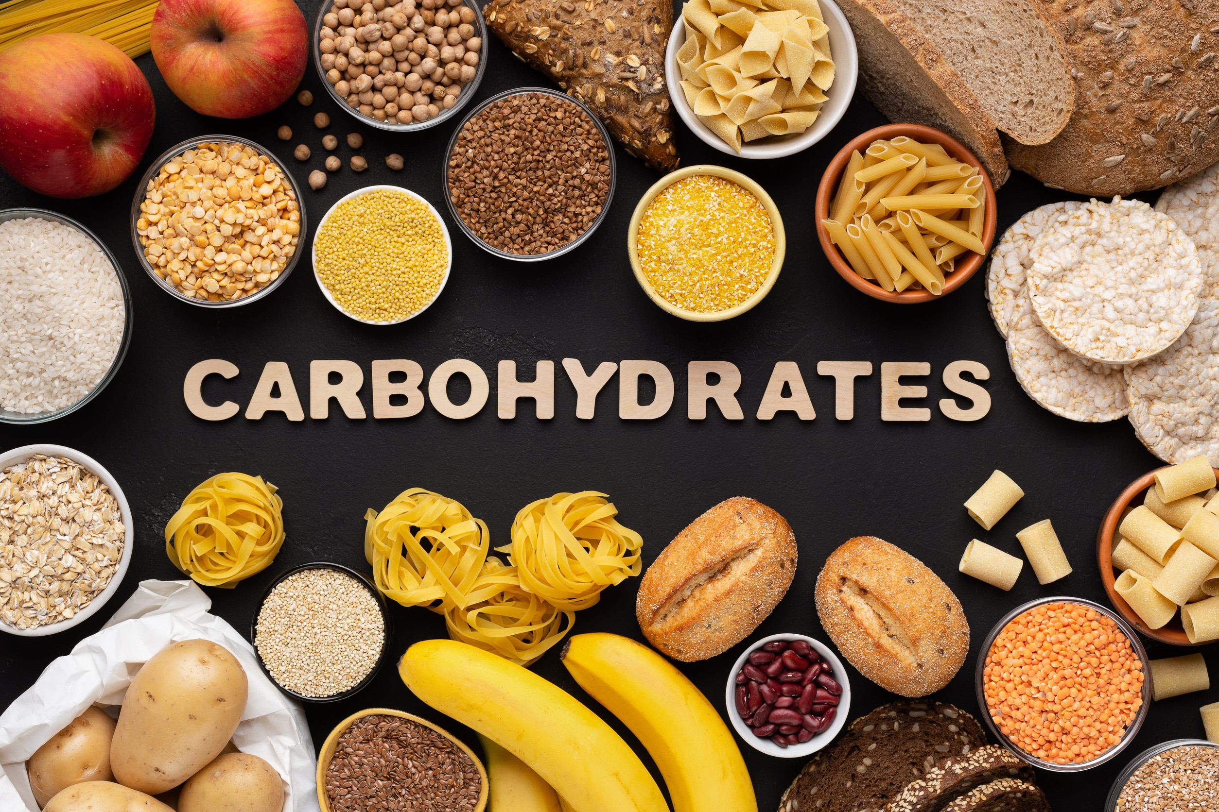 High fibre and carbohydrates healthy food with grains and text on black background