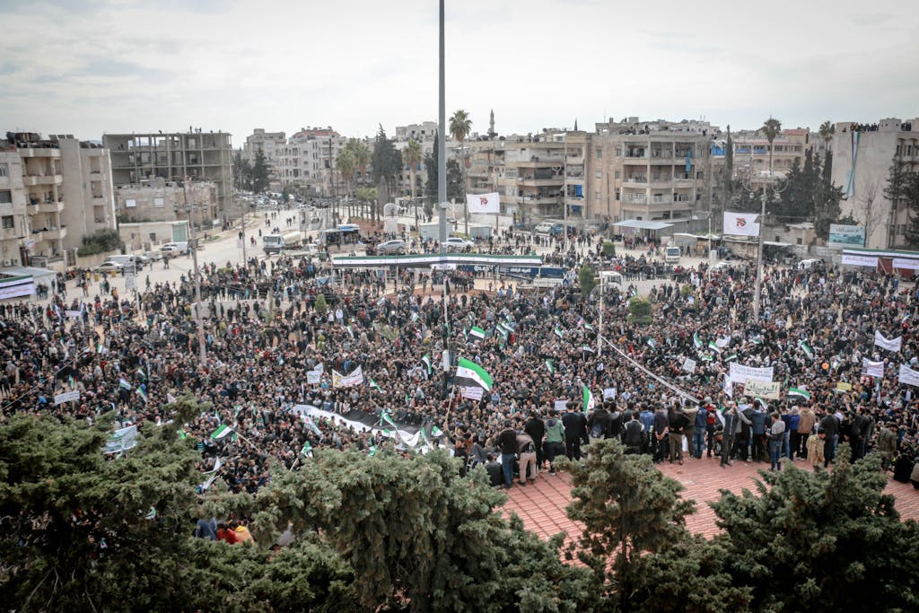 A massive protest in Idlib, Syria, showcasing activism and public dissent.