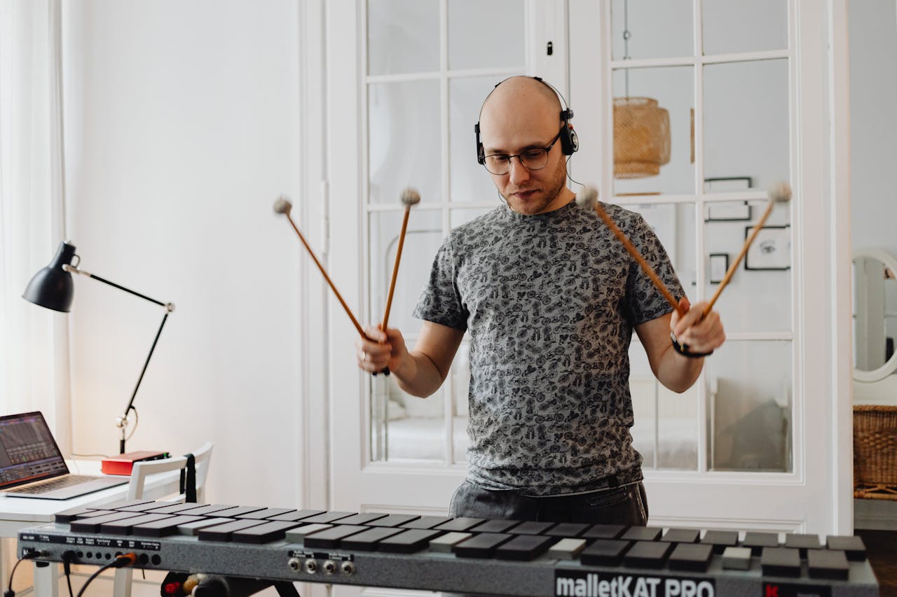 man-playing-black-xylophone