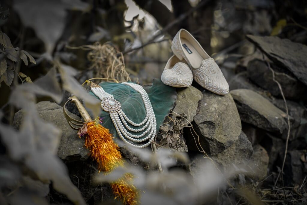 /elegant-bridal-accessories-in-rustic-outdoor-setting-