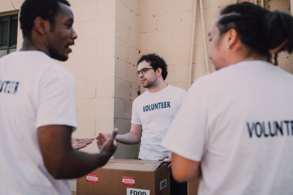 volunteer-men-in-white-shirts-