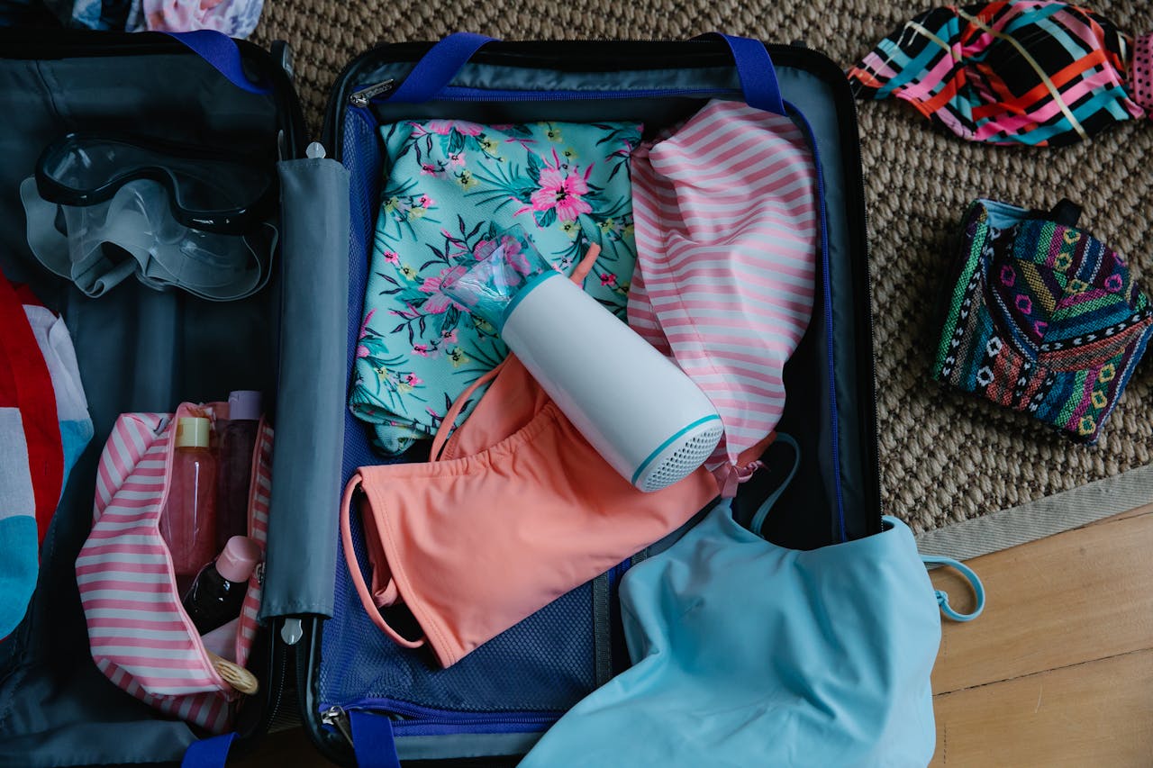 clothes-and-goggles-inside-a-suitcase-