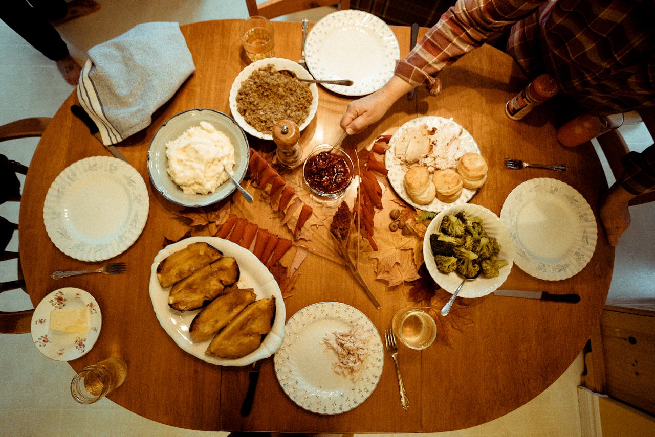 /flatlay-photography-of-cooked-food-on-brown-wooden-table-
