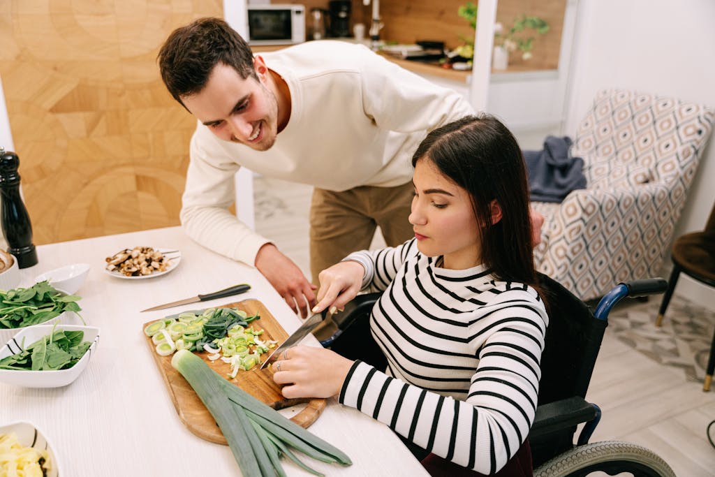 A couple cooking together, highlighting inclusivity and togetherness in the kitchen.