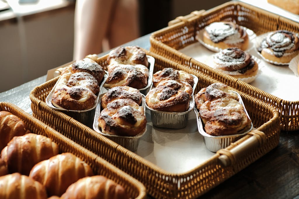 A delicious assortment of freshly baked bread rolls displayed in a bakery setting in Ho Chi Minh City.