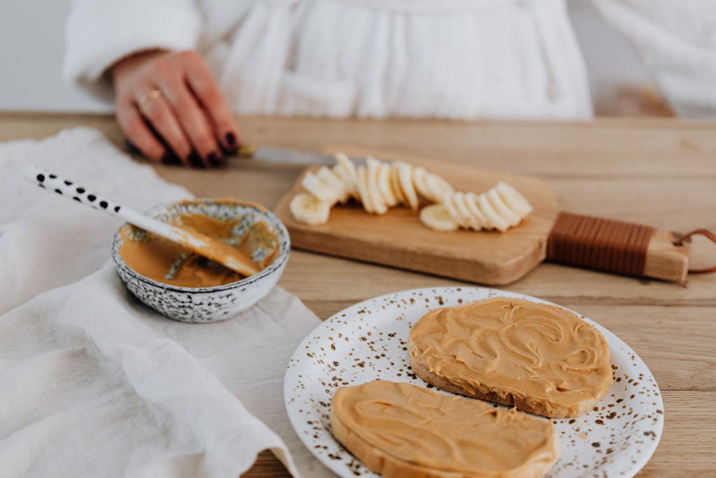 Close-up of peanut butter and banana on toast, perfect for a healthy breakfast.