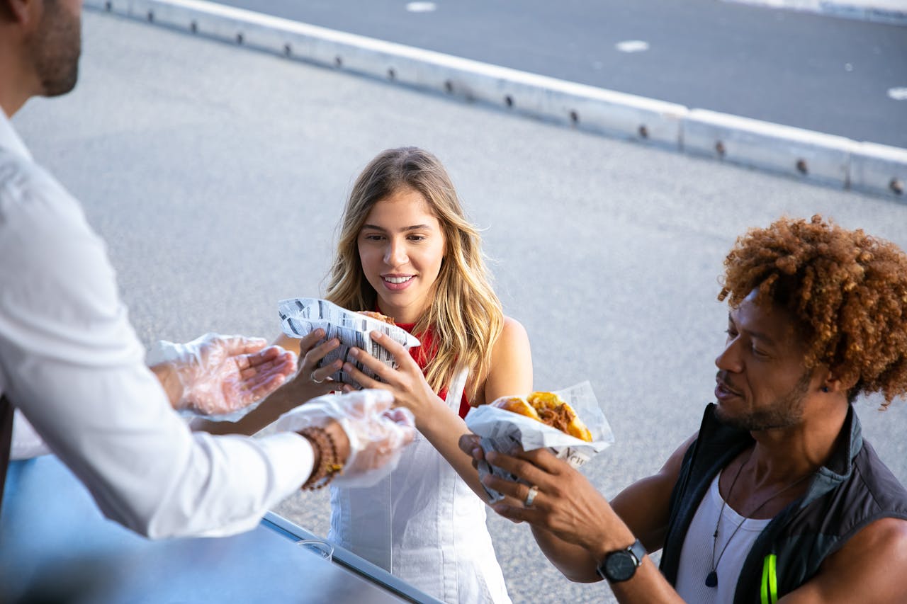 seller-giving-order-to-multiethnic-couple-
