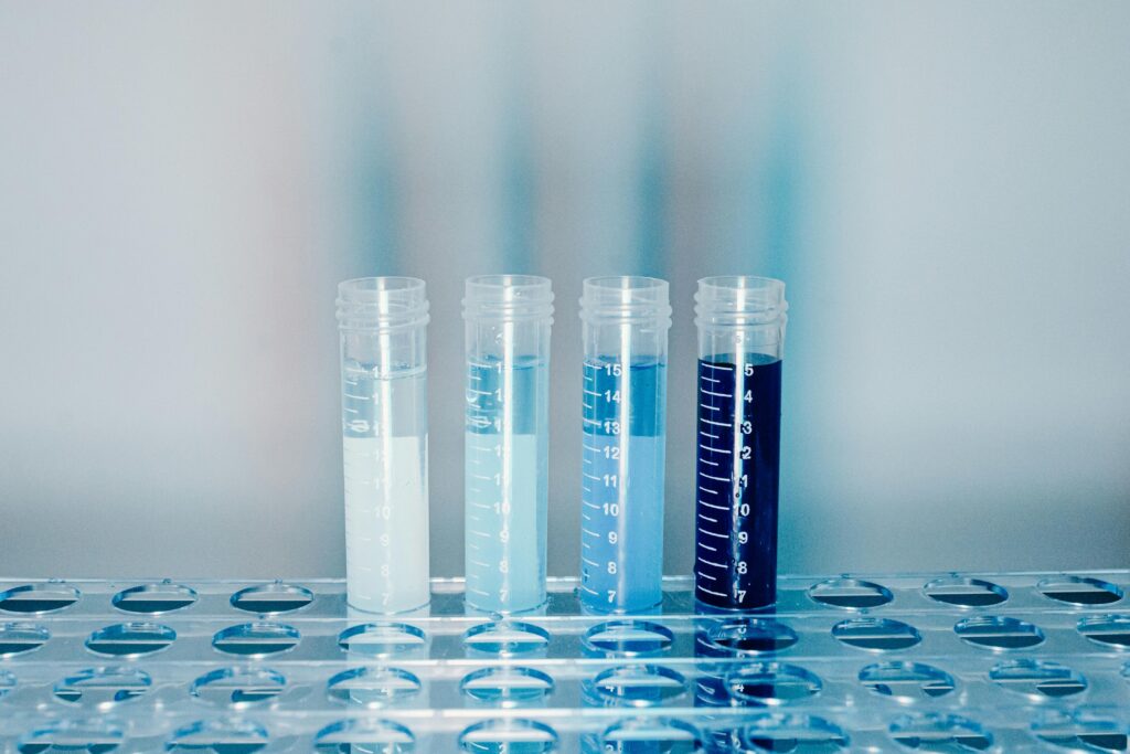 clear-plastic-test-tubes-with-blue-liquid