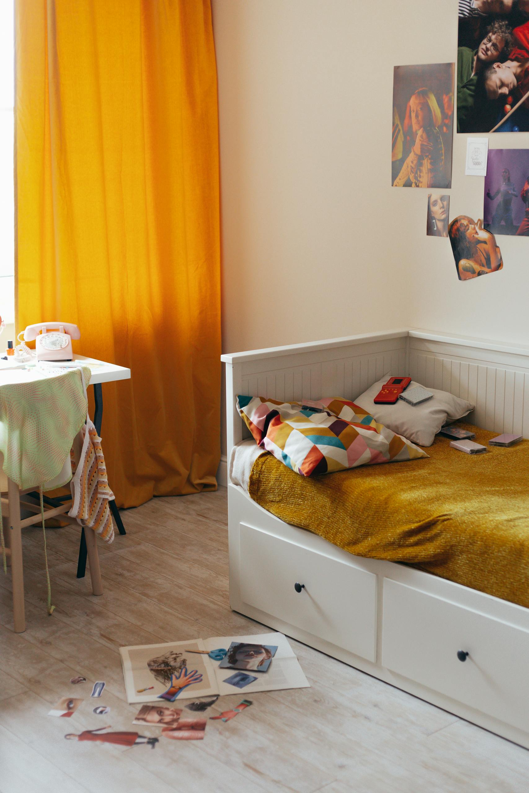 Warm bedroom scene featuring a decorated wall, a cozy bed, and a bright curtain. Ideal for interior inspiration.