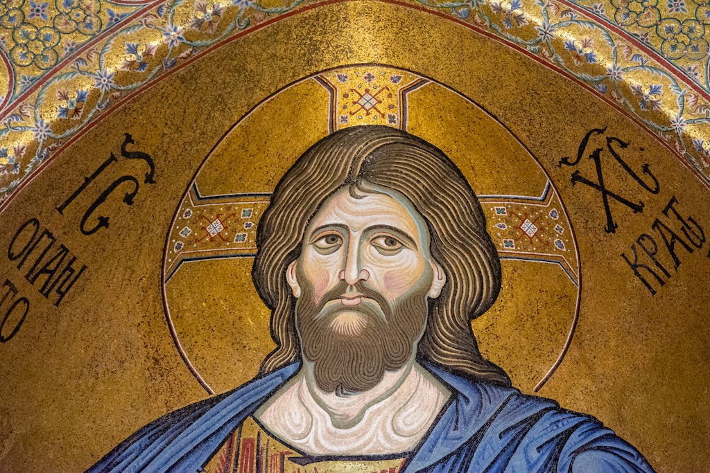 Detailed mosaic of Christ Pantocrator with intricate gold and religious symbolism.